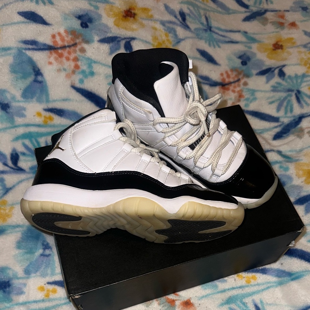 Jordan Kids Black and White High-Top Sneakers. Shoestrings need replacing